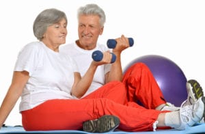 aging couple exercising