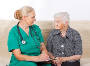 aging woman with nurse